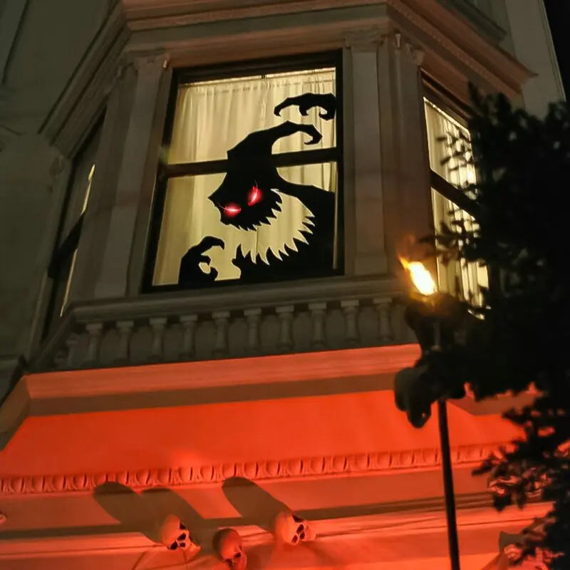Spooky Monster Window Silhouette with Glowing Eyes